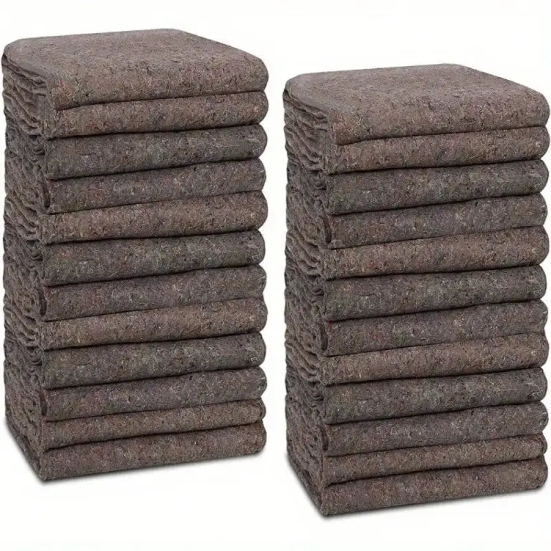 Two stacks of brown moving blankets.