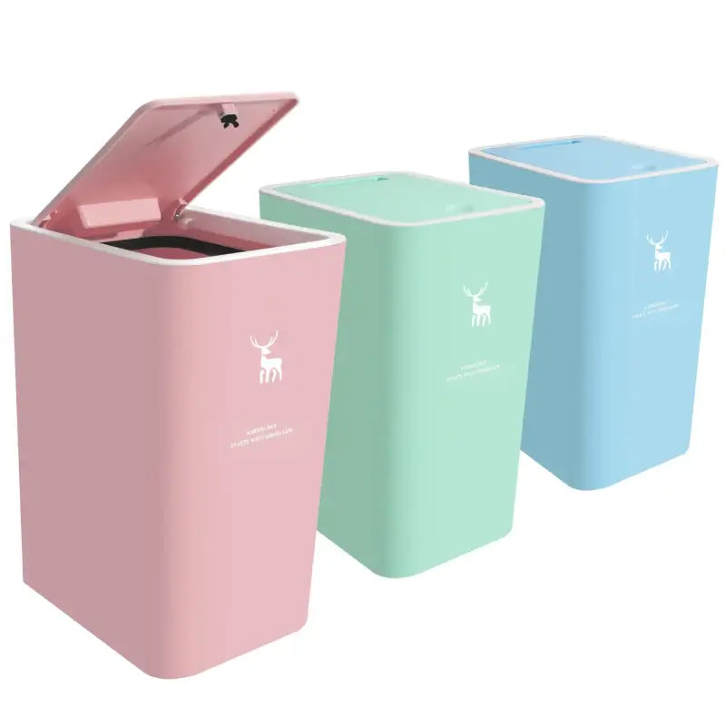 Three pastel-colored trash cans with deer logos.