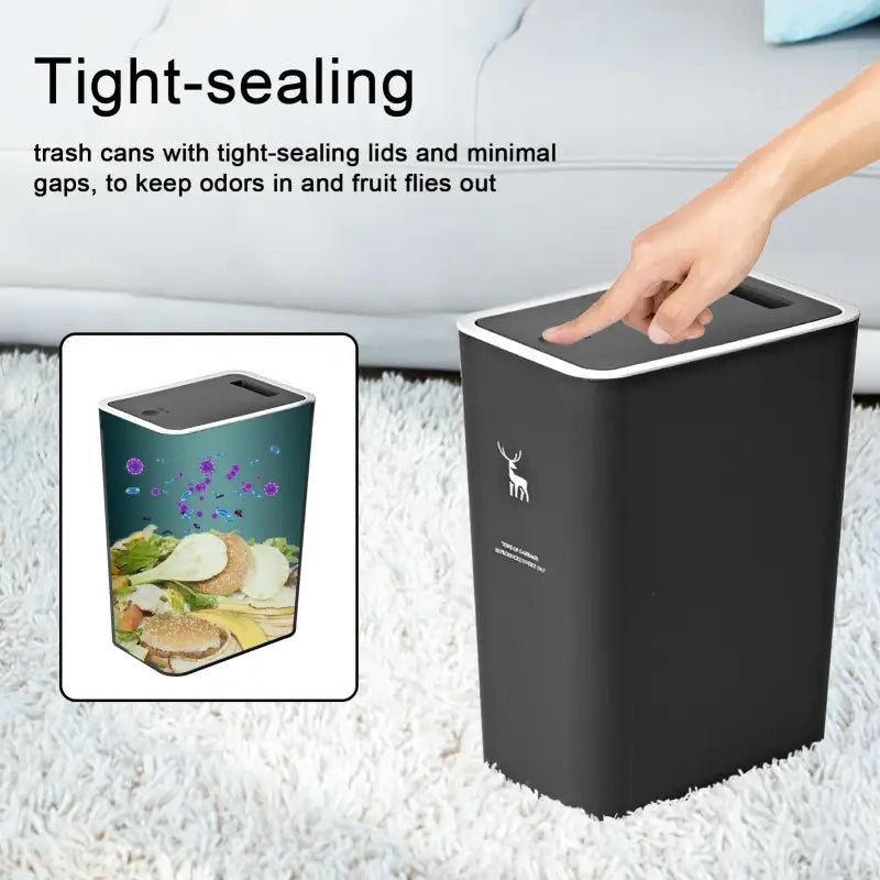 Black rectangular trash can.