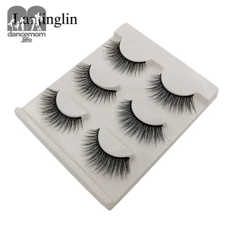 False eyelashes in a plastic tray.