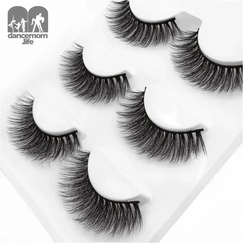 False eyelashes on a white tray.