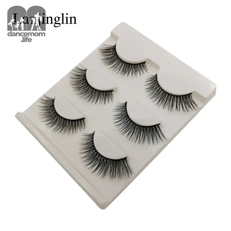False eyelashes in a plastic tray.