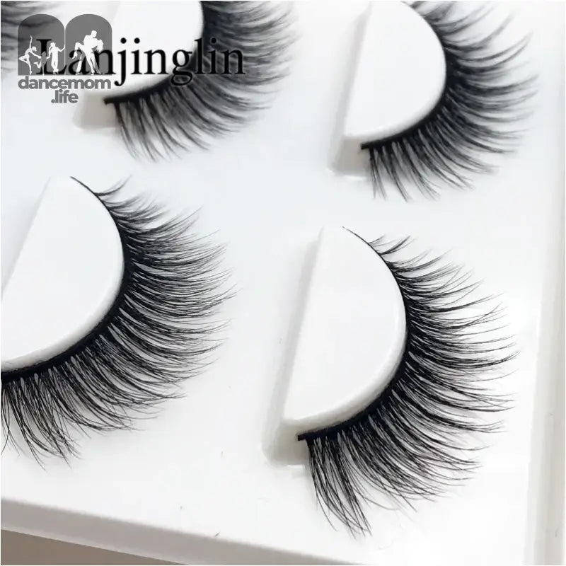 False eyelashes on white holders.