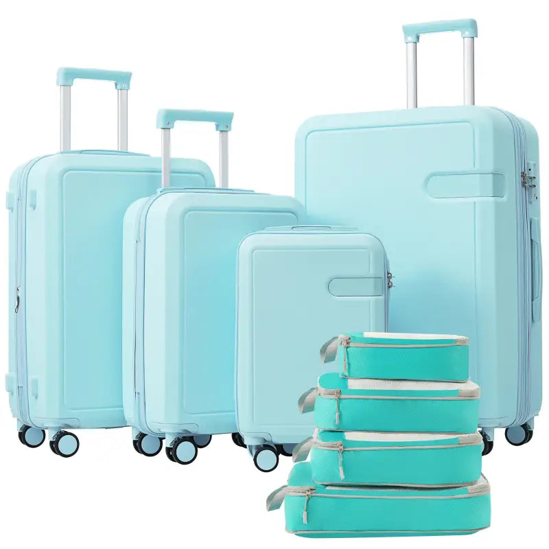 Aqua luggage set with packing cubes.