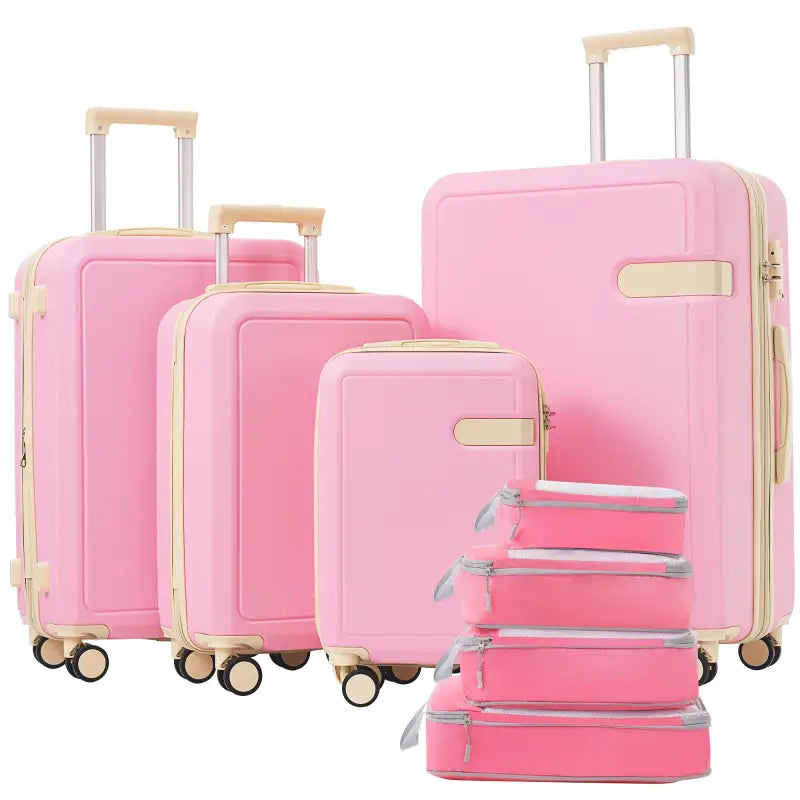 Pink luggage set with packing cubes.