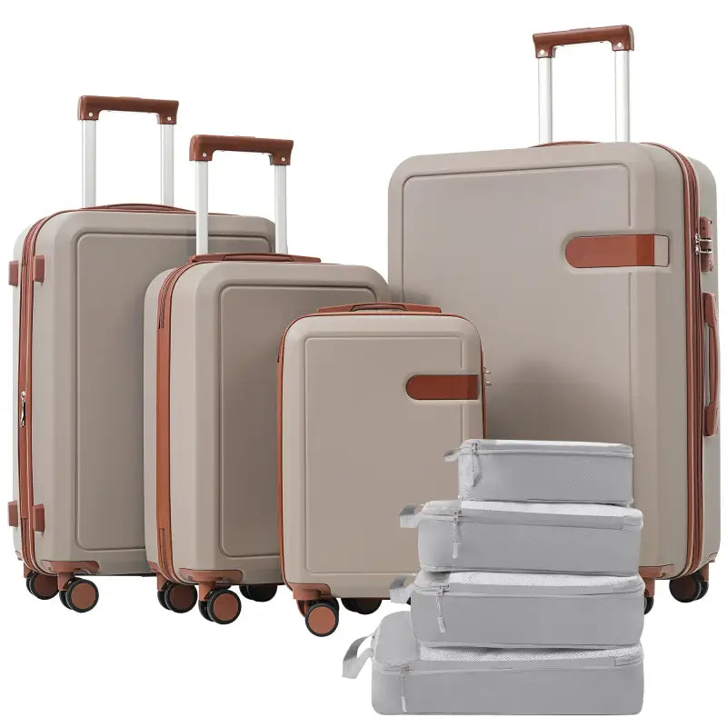 Set of beige suitcases with brown accents.