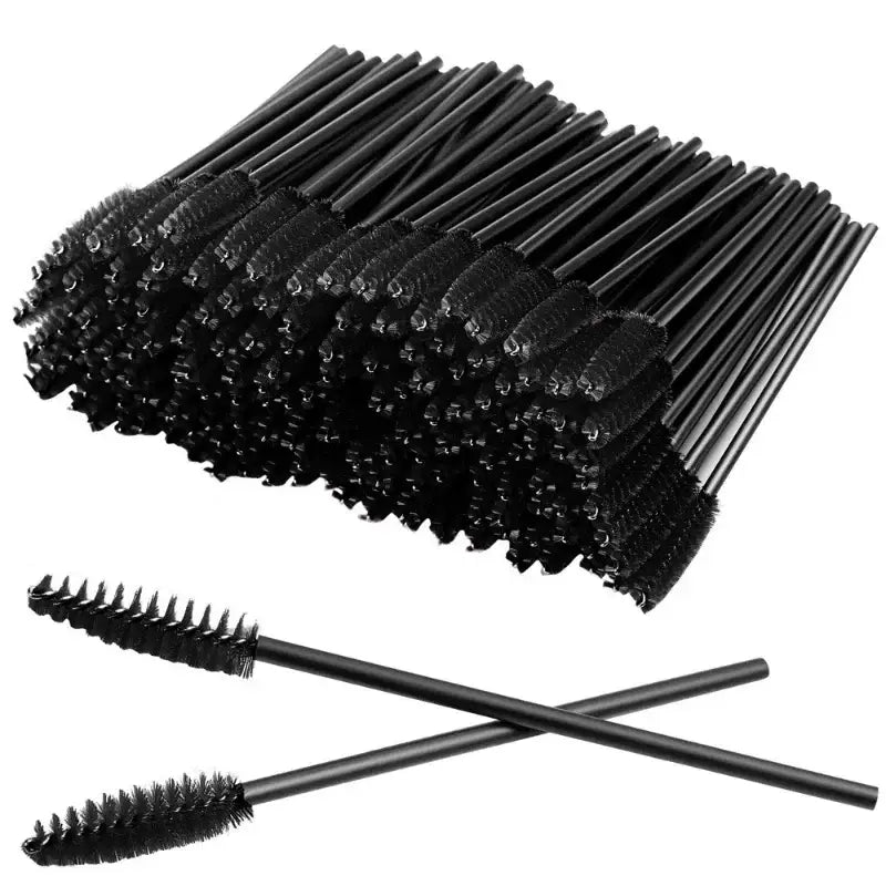 Black disposable mascara wands.