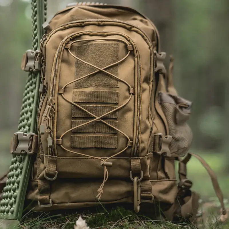 Tan tactical backpack.