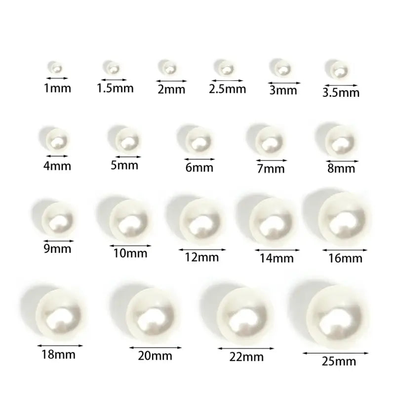 A collection of white silicone or rubber grommets in various diameters.