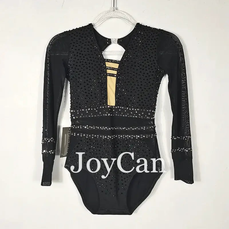 Black sparkly long-sleeved gymnastics leotard with rhinestone embellishments and mesh details.