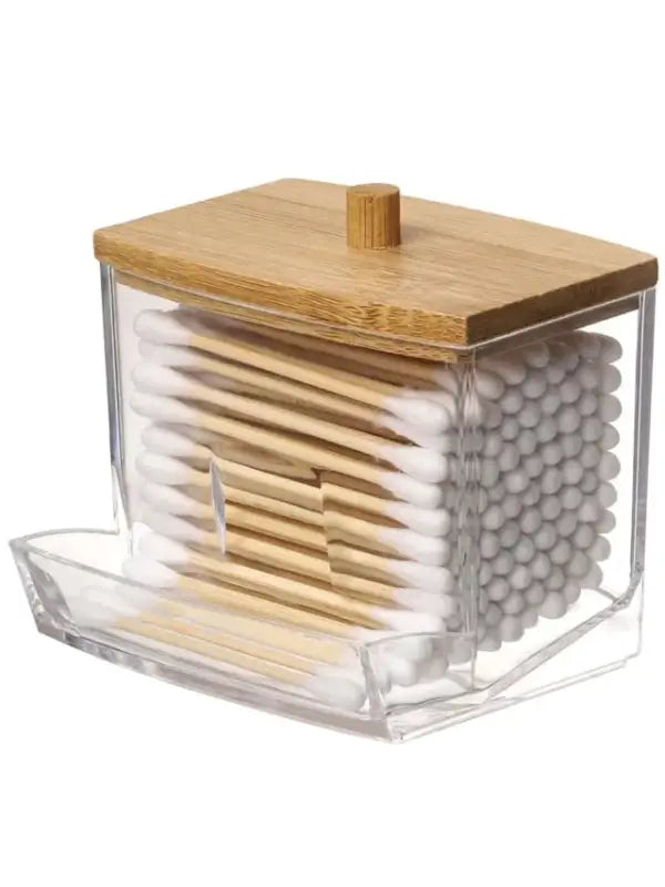 Cotton swab storage container with bamboo lid.