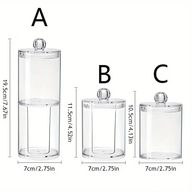 Three clear acrylic storage containers with lids.