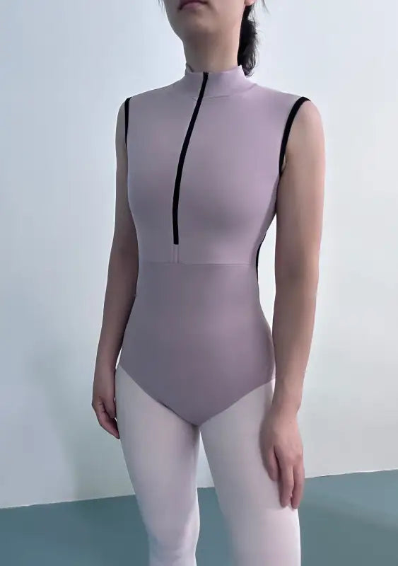 Sleeveless lavender leotard with black trim and front zipper detail.