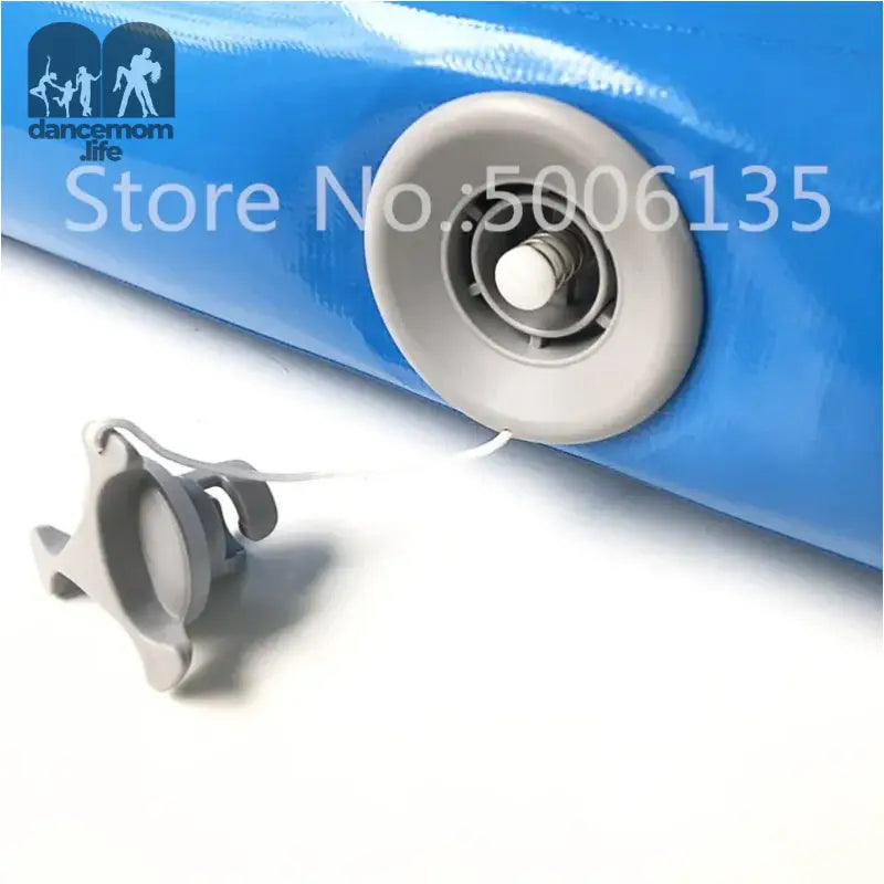 Inflatable blue object with gray valve and tethered cap.