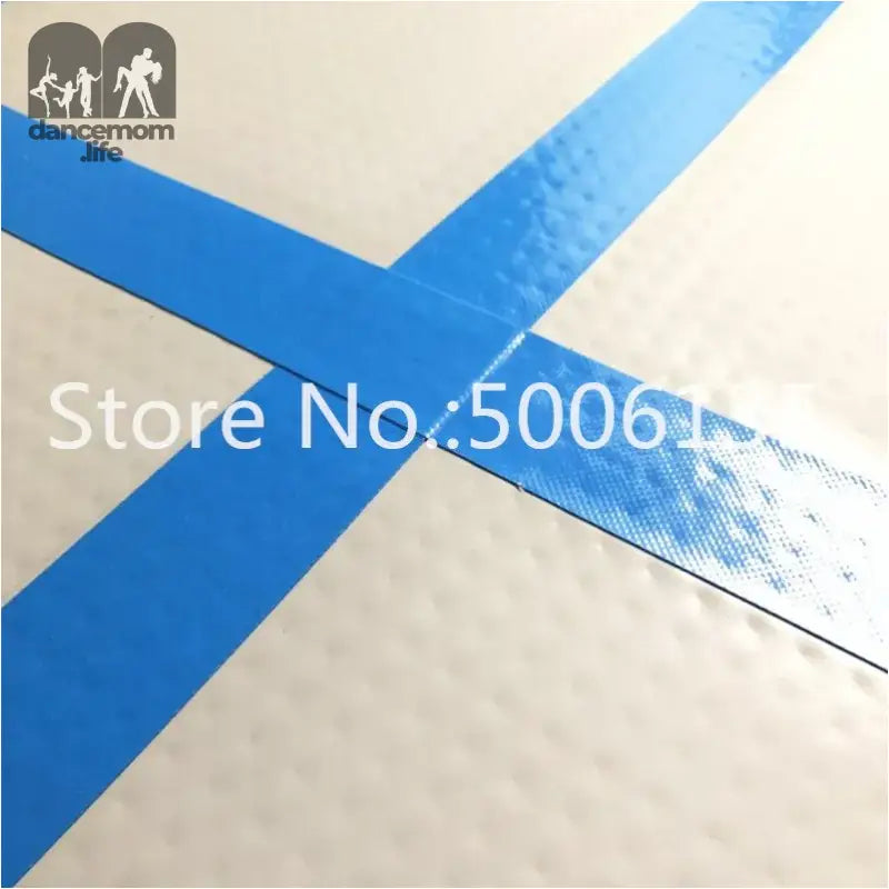 Blue tape cross.