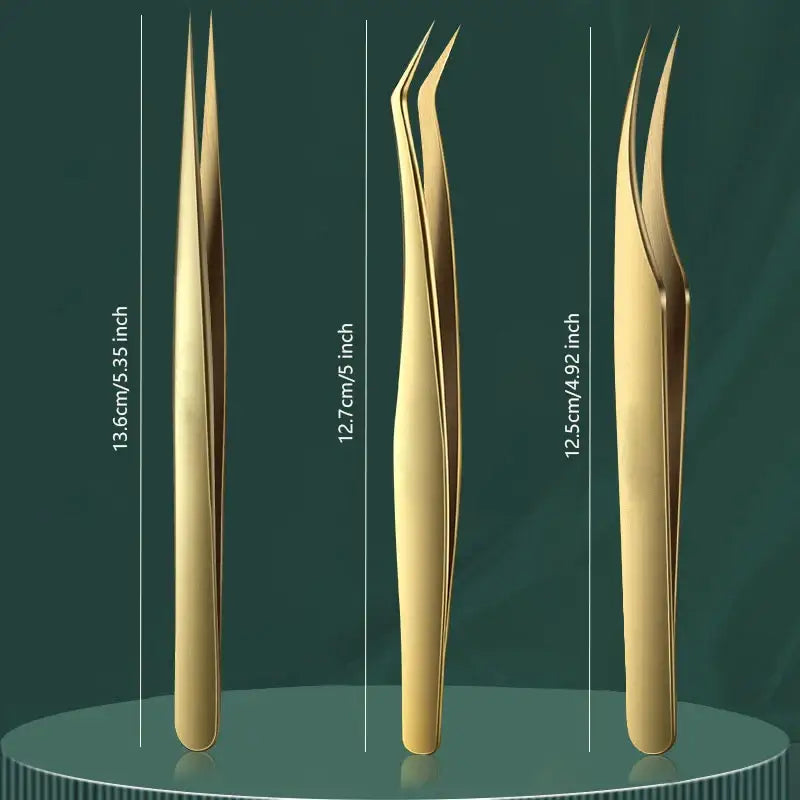 Three gold-colored tweezers.