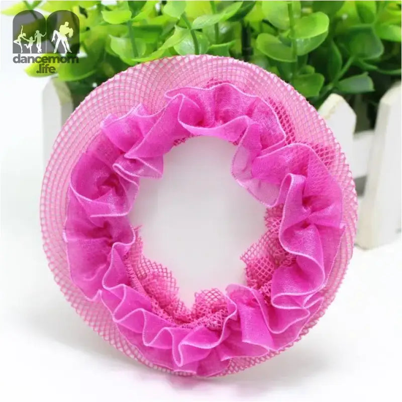 Pink ruffled hair scrunchie with mesh fabric detailing.