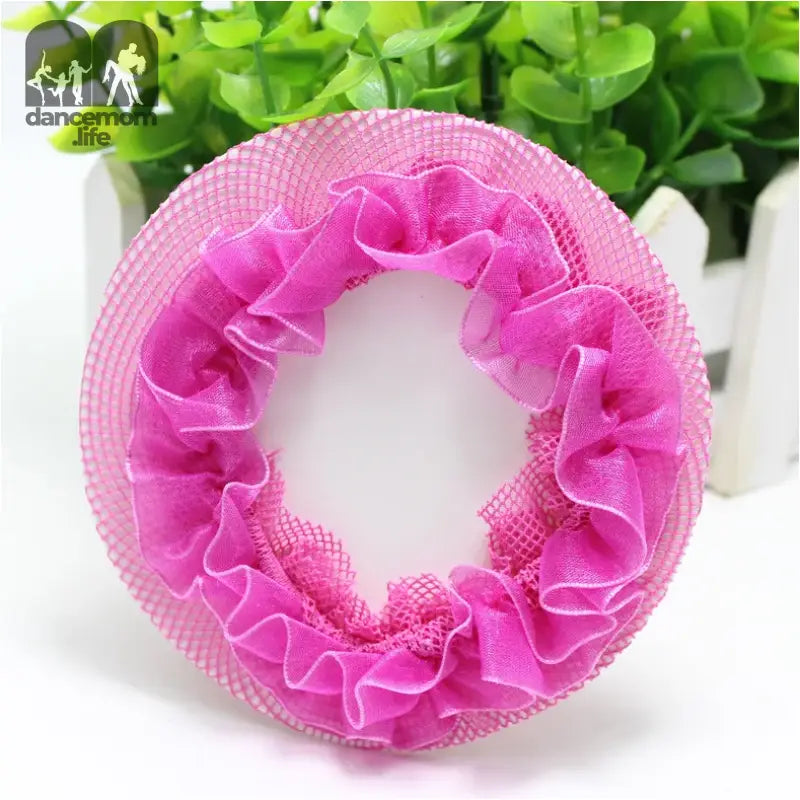 Pink ruffled elastic hair scrunchie with mesh detailing.