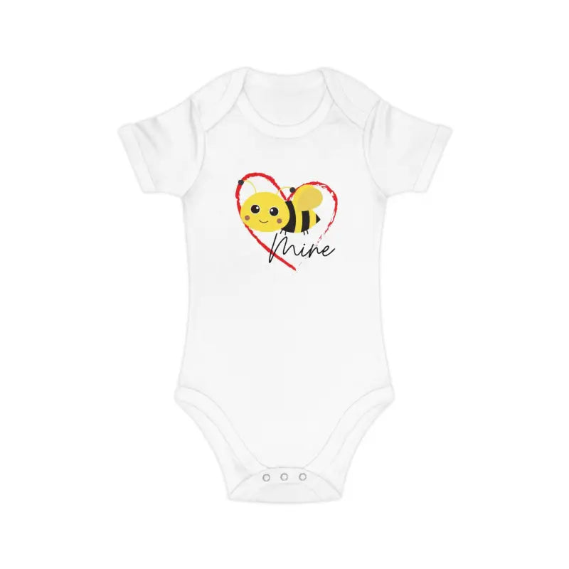 White baby onesie with a cute cartoon bee and heart design.
