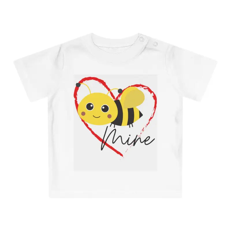 White t-shirt with a cute cartoon bee and heart design that says ’mine’