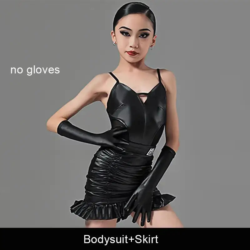 Black leather bodysuit with ruffle skirt and matching long gloves.