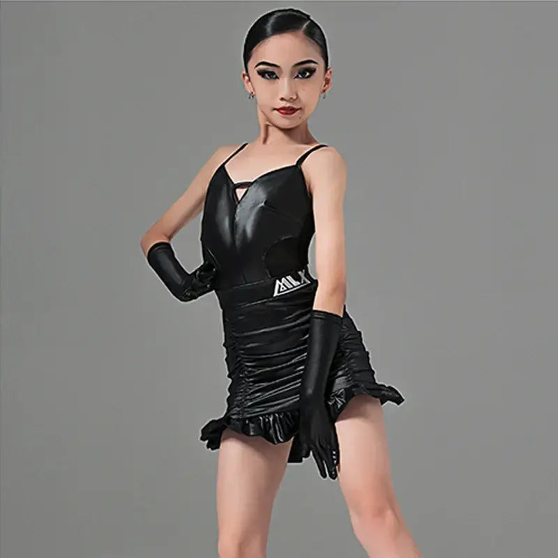 Black leather dance costume with ruched details and long gloves.