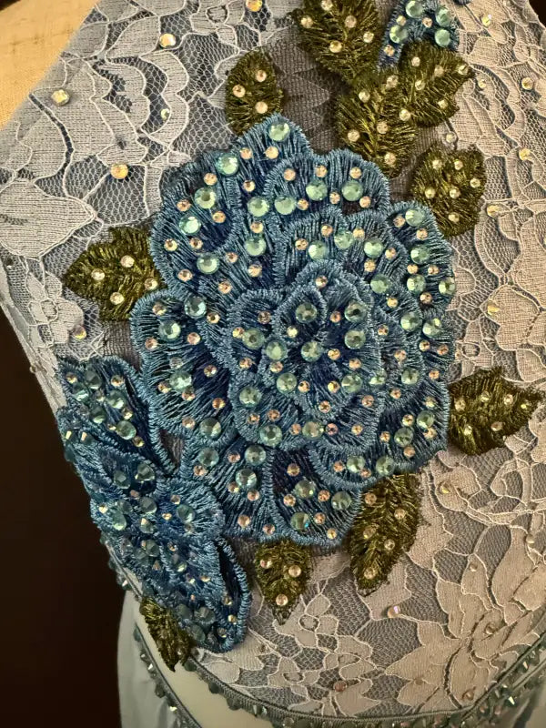 Blue floral lace dress embellishment.
