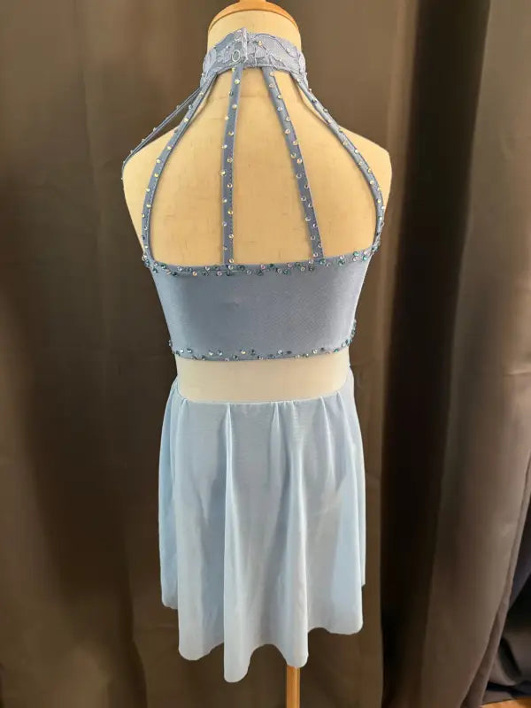 Light blue dance costume.
