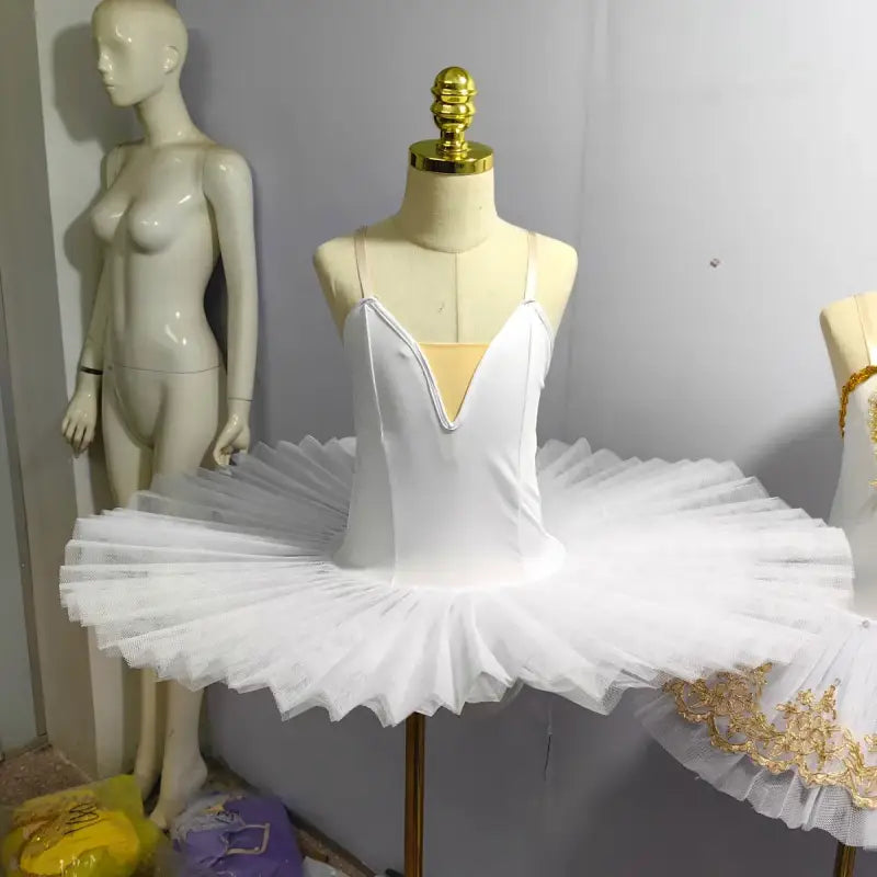 White classical ballet tutu with a plunging V-neckline bodice.