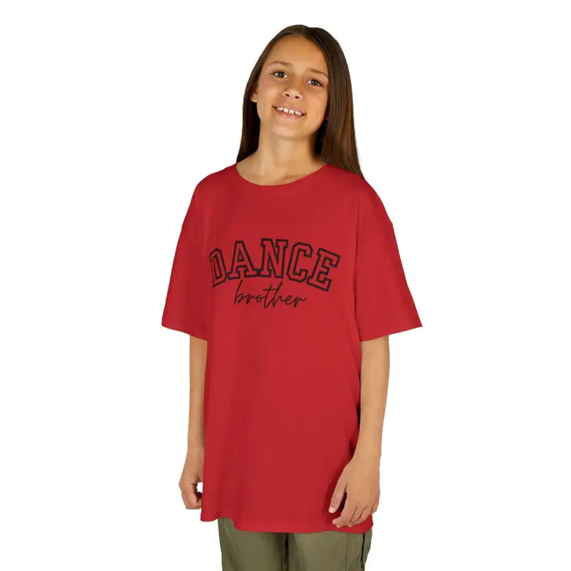 Red t-shirt with ’DANCE’ text printed in black letters.