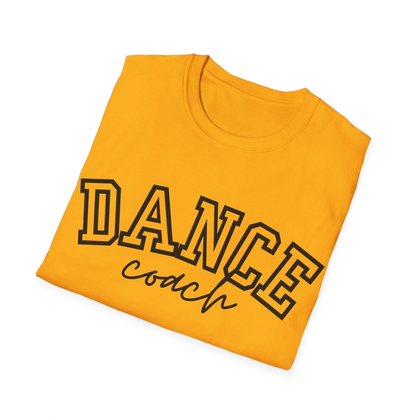 A folded mustard-yellow cotton t-shirt featuring bold black ’dance’ lettering with a outlined design and cursive ’coach’ script beneath it.