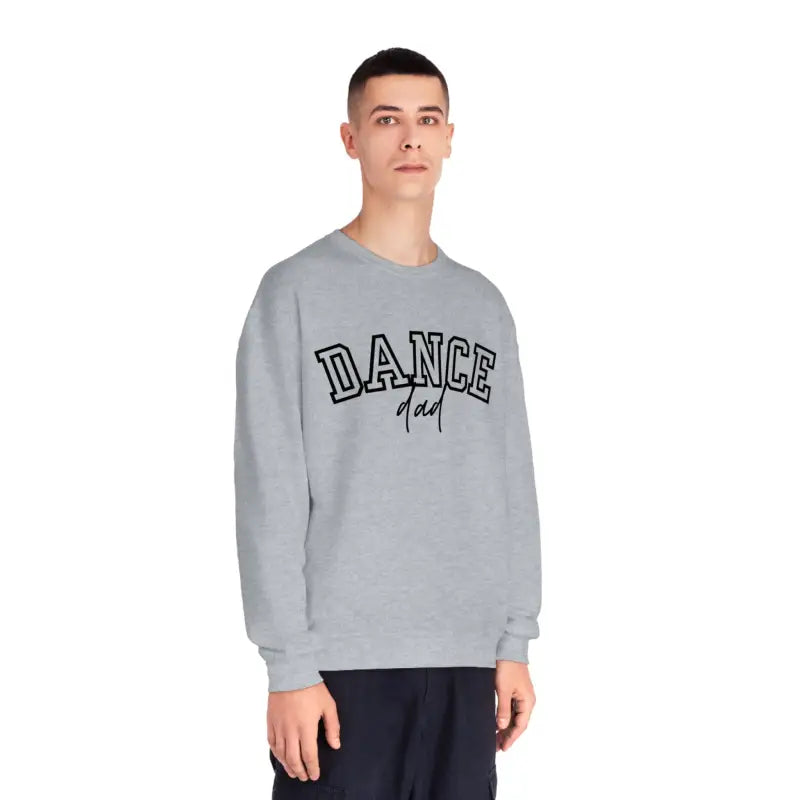 Gray sweatshirt with ’DANCE’ printed in large letters on the front.