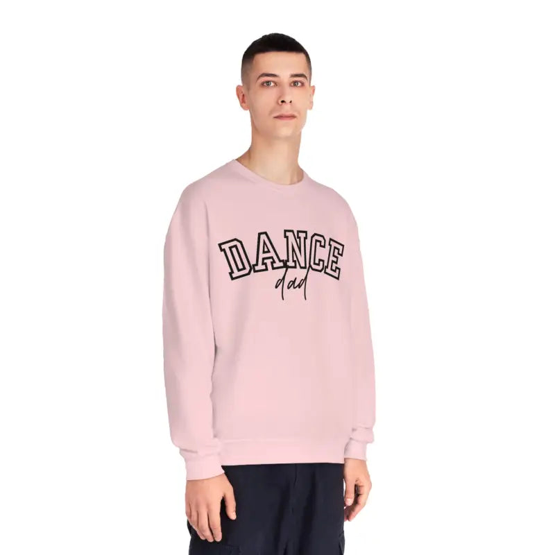 Pink sweatshirt with ’DANCE’ text printed on the front.