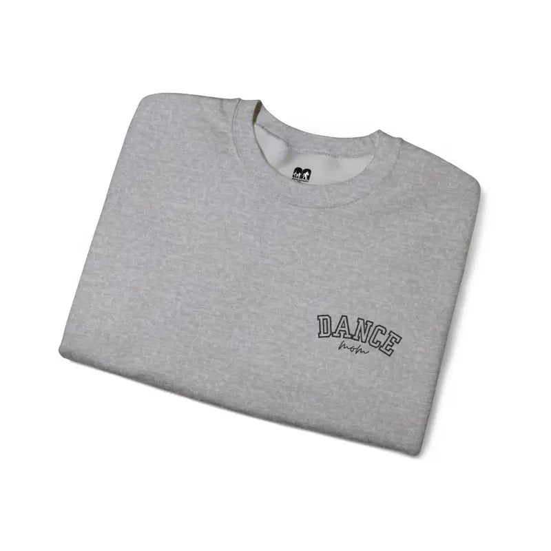 Grey t-shirt with ’DANCE’ text printed on it.