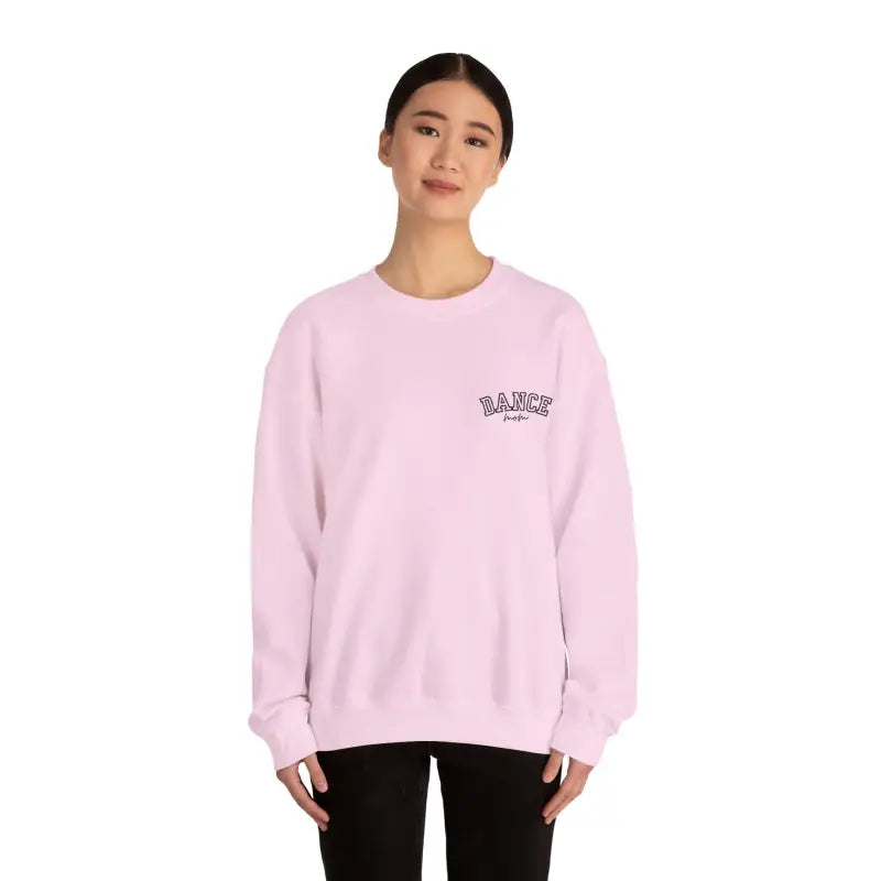 Pink crewneck sweatshirt with small text graphic on the chest.