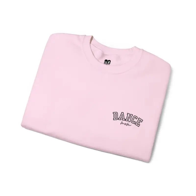 Pink t-shirt with ’DANCE’ text printed on it.