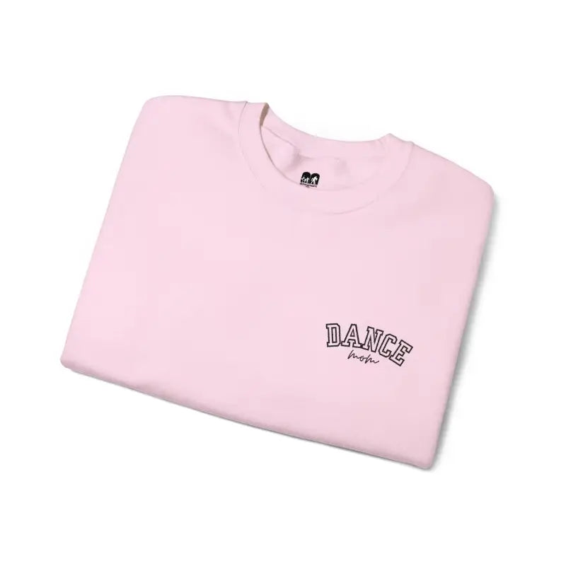 Pink t-shirt with ’DANCE’ text printed on it.