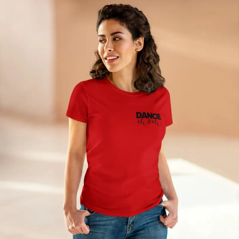 Red t-shirt with ’DANCE’ printed on the chest.