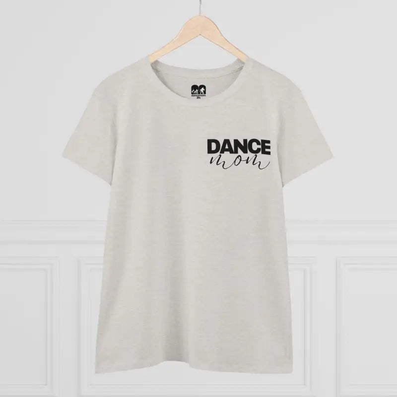 White t-shirt with ’DANCE’ text printed on the front.
