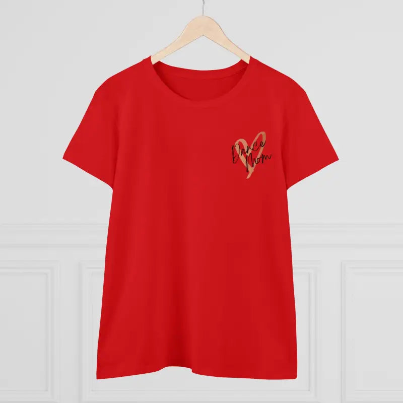 Red t-shirt with a small heart design on the chest.
