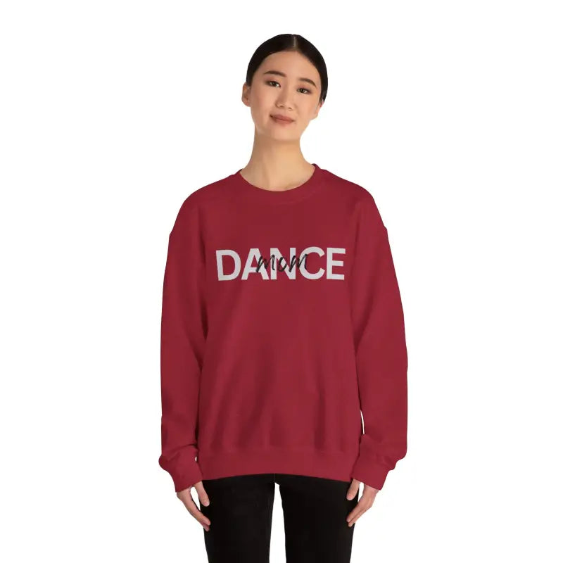 Burgundy crewneck sweatshirt with ’DANCE’ text printed across the chest.