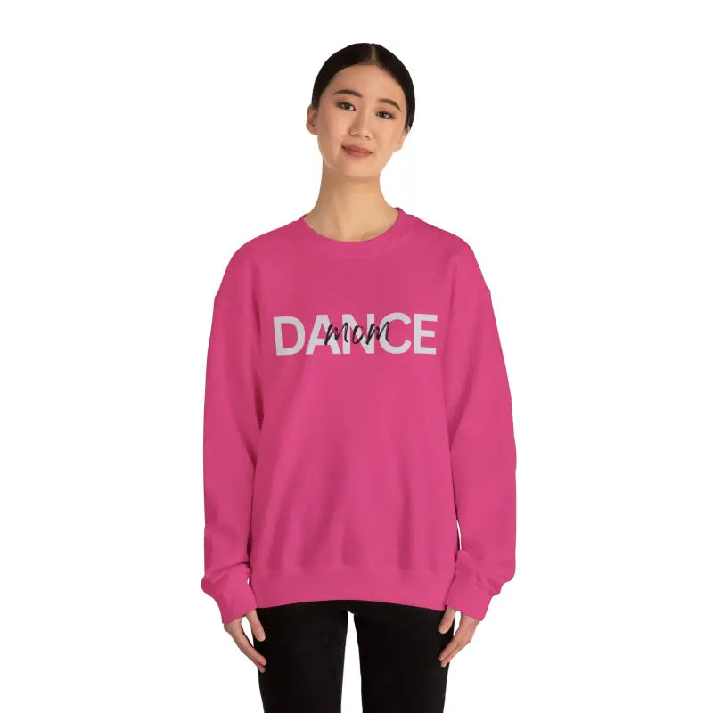 Hot pink crewneck sweatshirt with ’DANCE’ text printed on the front.