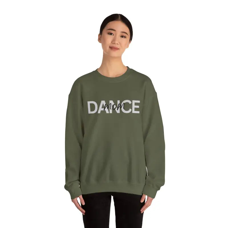 Olive green sweatshirt with ’DANCE’ text printed across the chest.