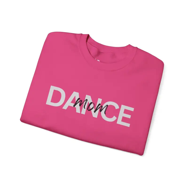 Pink sweatshirt with ’DANCE MOM’ text printed in white letters.