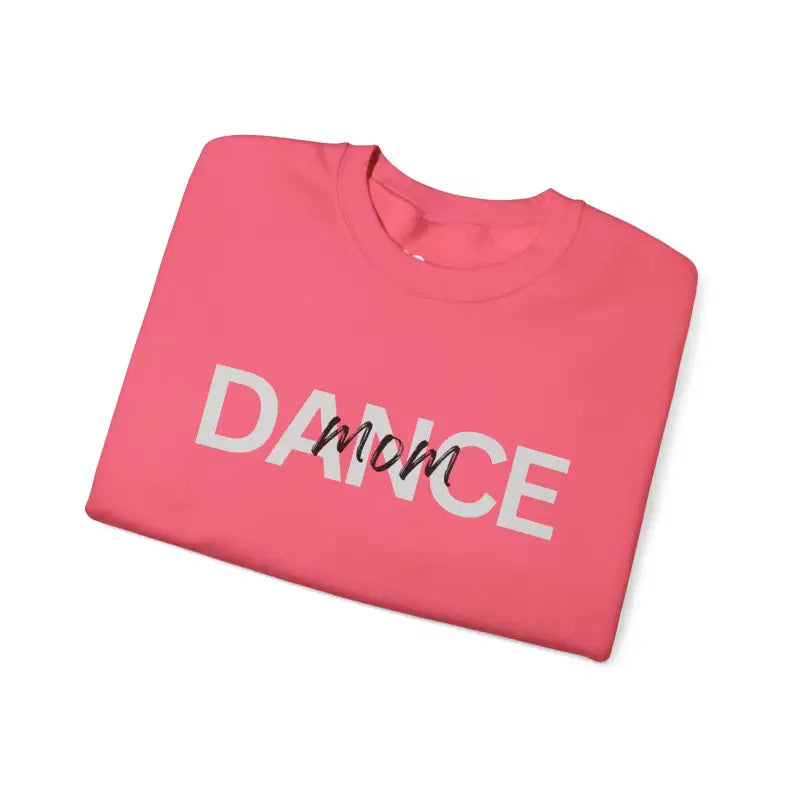 Pink sweatshirt with ’DANCE mom’ text printed on it.