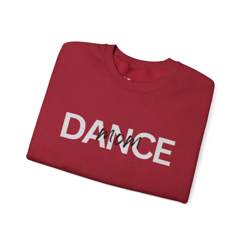 Red sweatshirt with ’DANCE’ text printed in white letters.