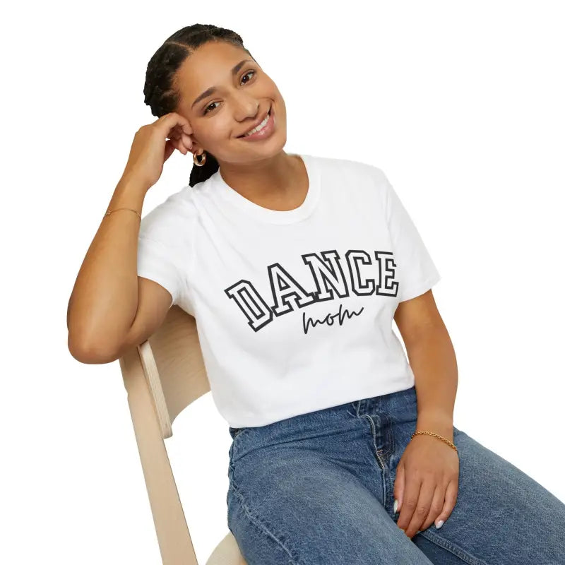 White t-shirt with ’DANCE’ text printed in outlined letters.