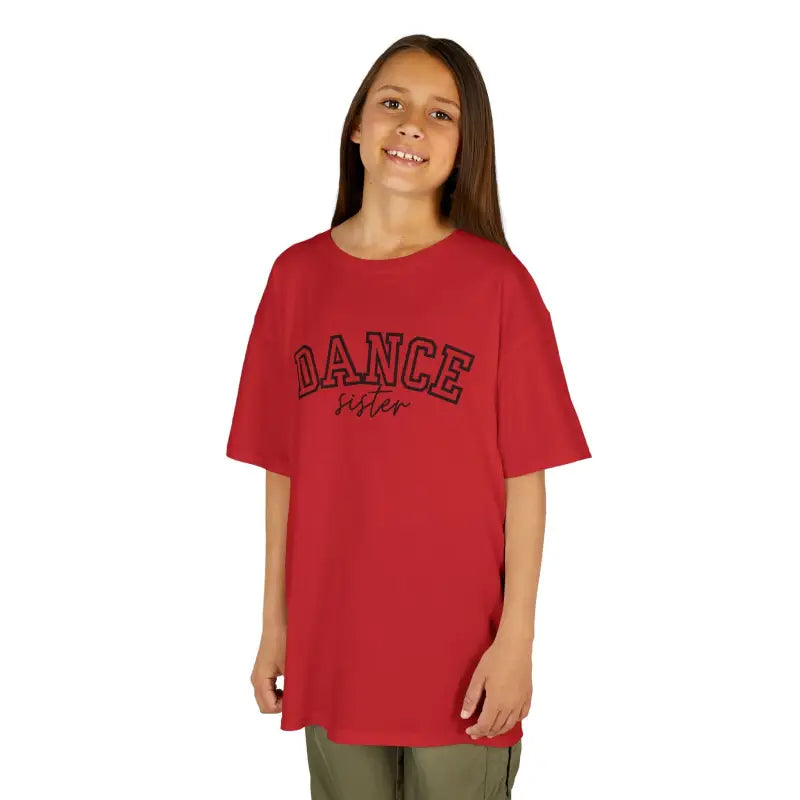 Red t-shirt with ’DANCE’ text printed in black letters.