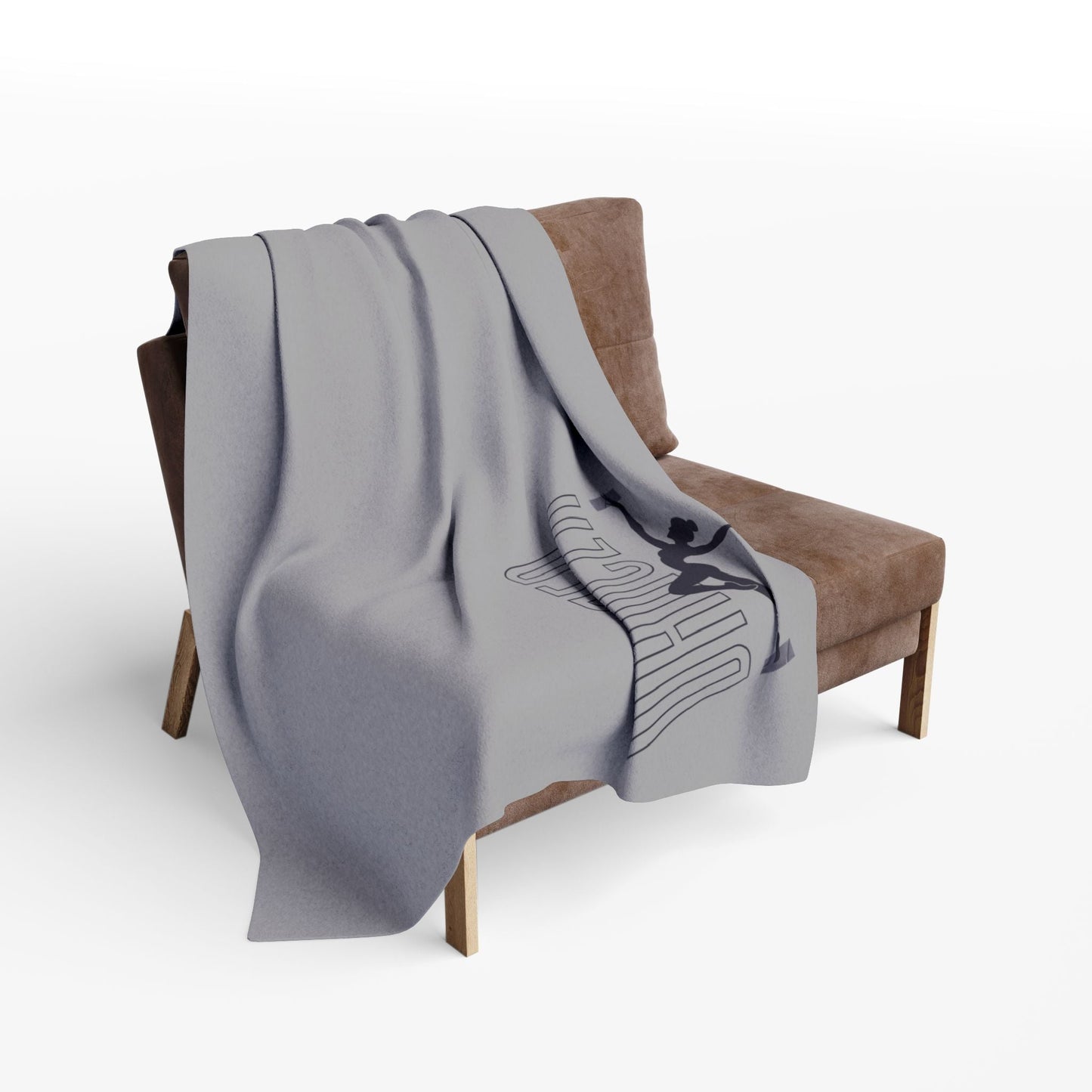 Gray throw blanket with a black graphic design featuring stylized text and a silhouette of a figure.