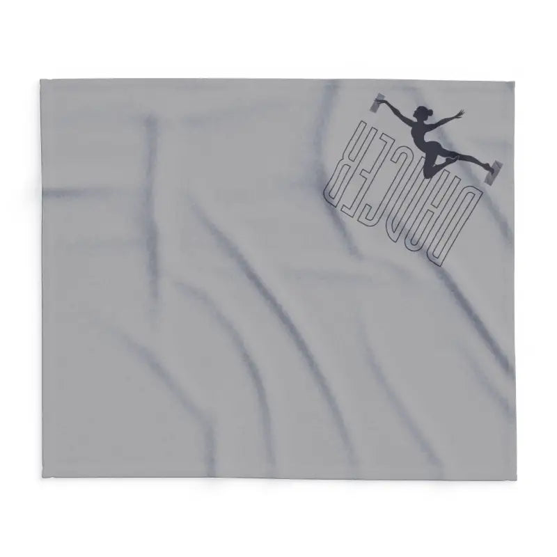 Silhouette of a figure ice skating above stylized text.